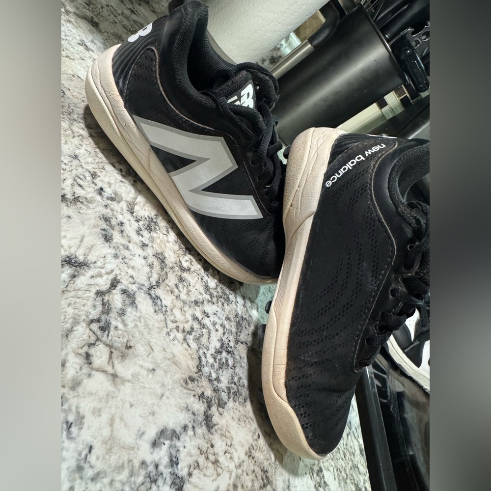 New Balance Kids Black and White Cleats